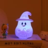 Hooded ghost hugging pumpkin style