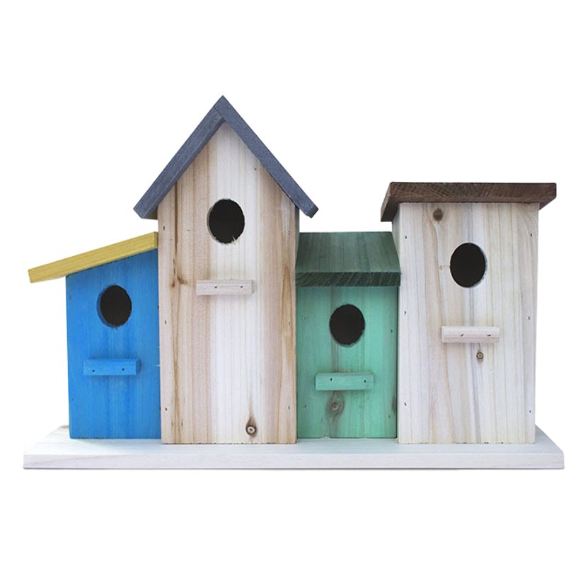 Casa de pájaros de madera decorativa