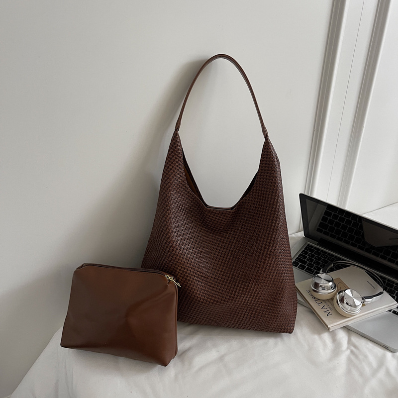 Bolso de comercio exterior de nicho de mujer retro tejido estriado bolso de mujer 2025 nuevo bolso de mano ocio de hombro bolso