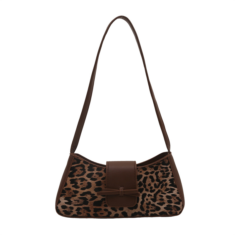 Bolsa de moda bajo la axila para mujeres de gran capacidad 2025 primavera nueva moda nicho bolso de hombro bolso de arco bolso de mano