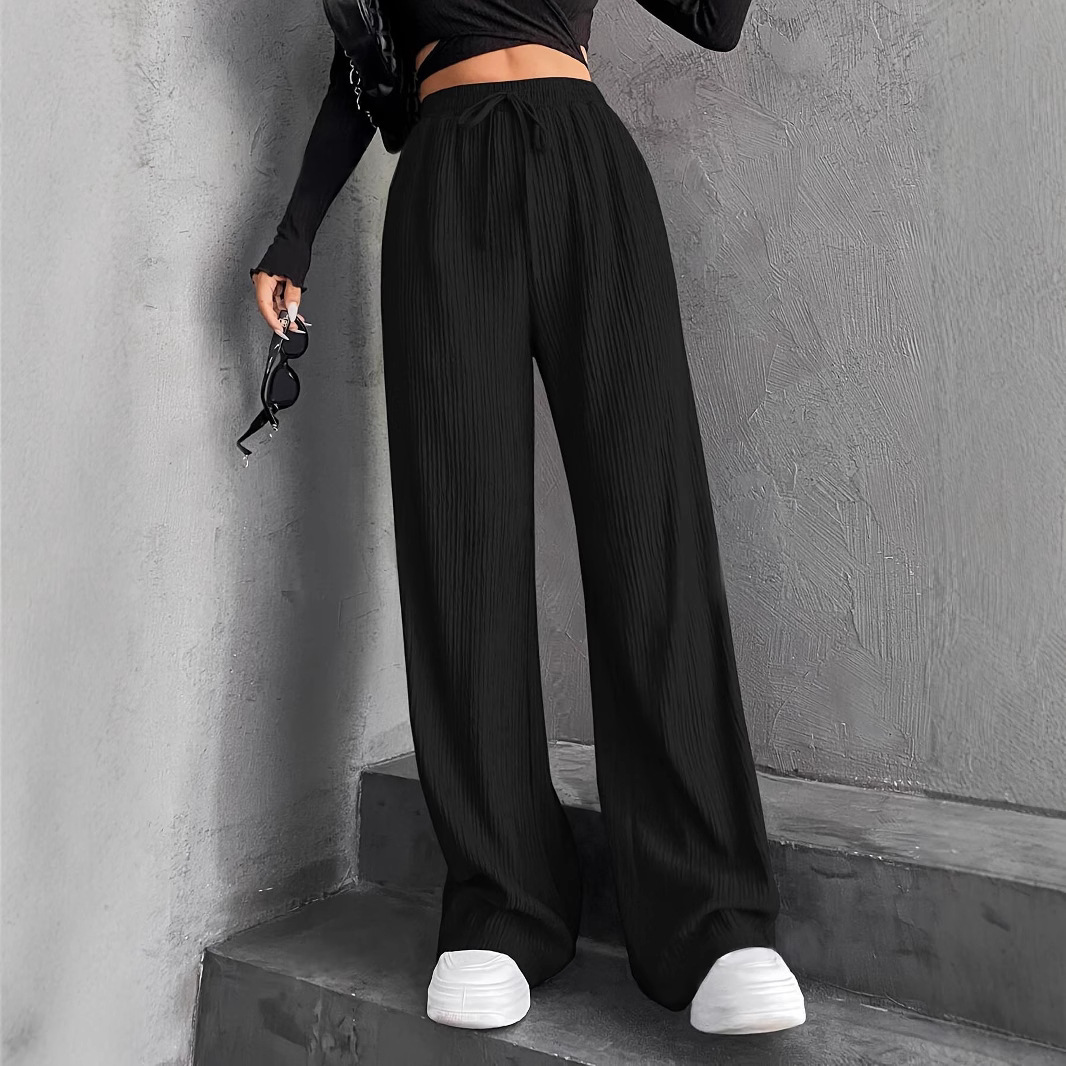 Pantalones largos informales de color liso para mujer, estilo europeo y americano, de corte cruzado, ideales para otoño e invierno de 2024._voghion.com