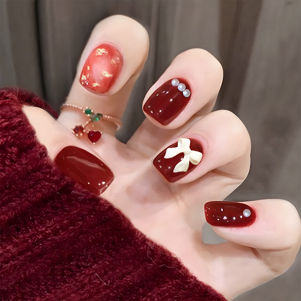Ventas domésticas cortas de perforación de punto de fábrica de uñas al por mayor para diseñar parches de manicura falsas desmontables