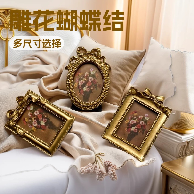Retro golden photo frame with bow for bed