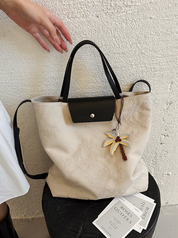 Bolso de mujer 2026 nuevo estilo coreano tela de gran capacidad bolso de mano de viaje simple diario mochila de hombro