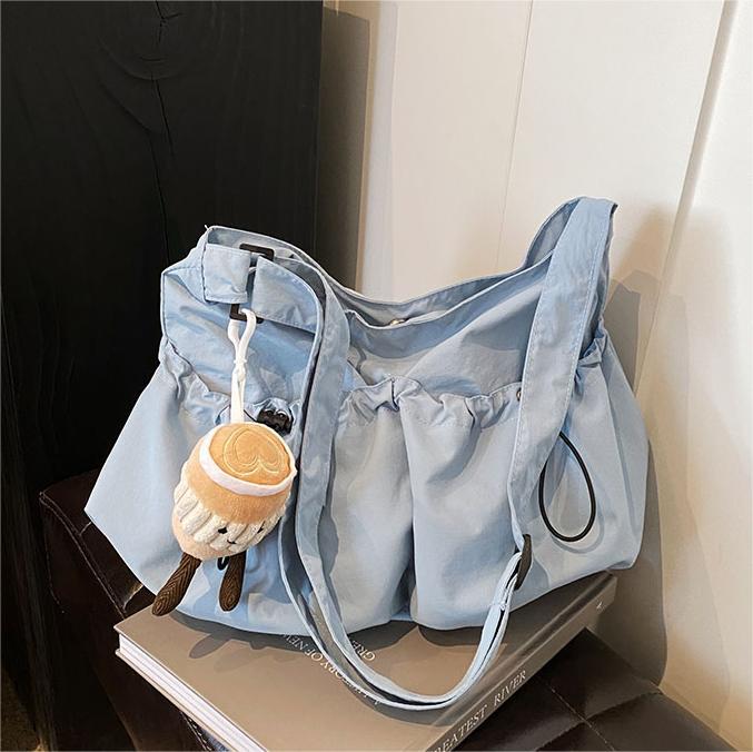 Bolsa de lona de gran capacidad para mujeres 2024 nuevo bolso de hombro casual simple de verano con un sentido de alta calidad de la bolsa de viaje