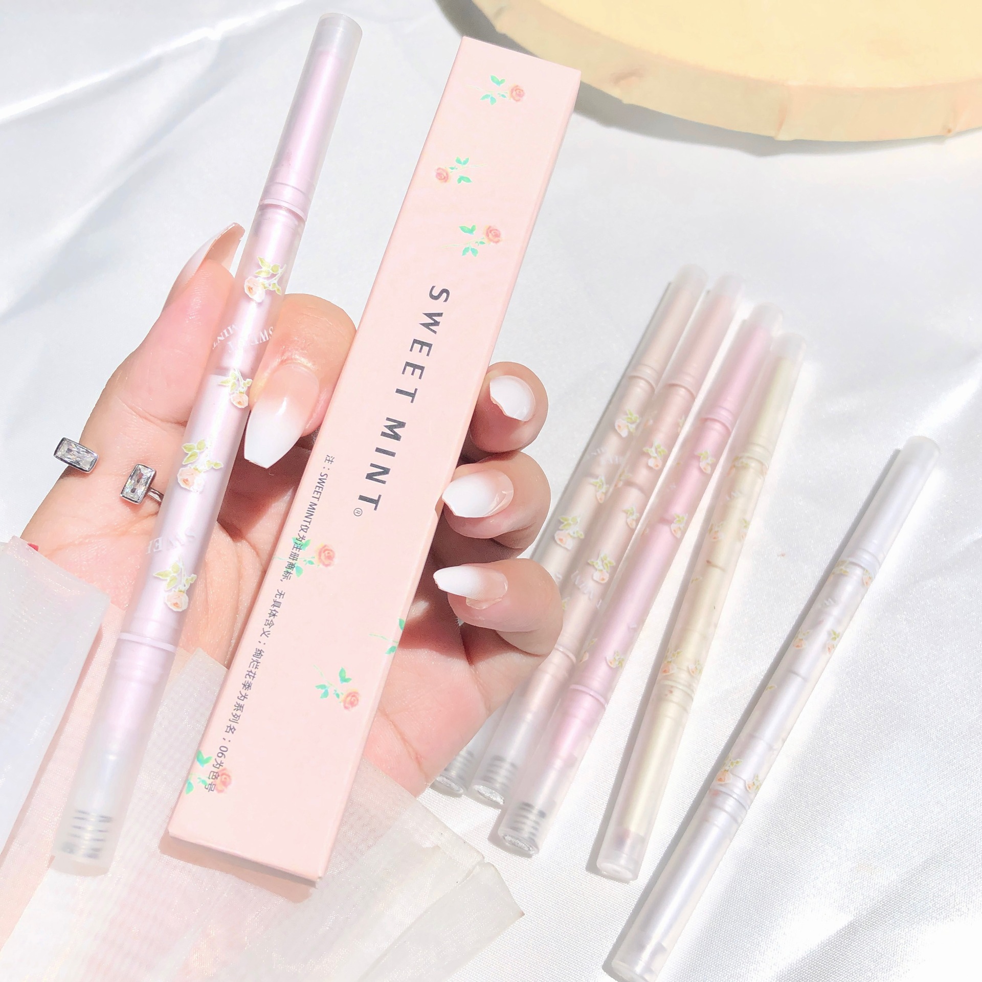 SWEET MINT's Splendid Flower Season Double-headed Silkworm pen with pearlescent and matte finishes to brighten the eyes and face, down to two-in-one undefined