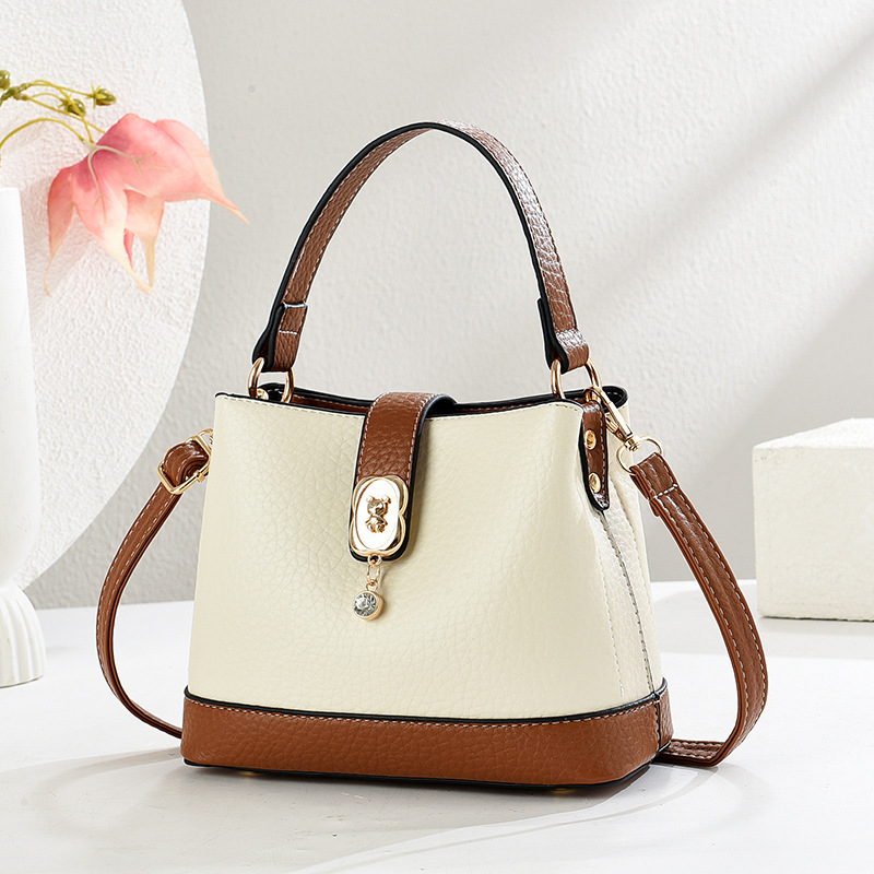 Bolso de cubo atmosférico 2025 nuevo bolso de moda de alta gama bolso de mensajero de todo fósforo casual bags transfronterizos