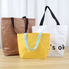 夏の新鮮なスポットブランクポータブル衣類バッグ印刷可能なロゴ広告ギフトプラスチック織りショッピングバッグ