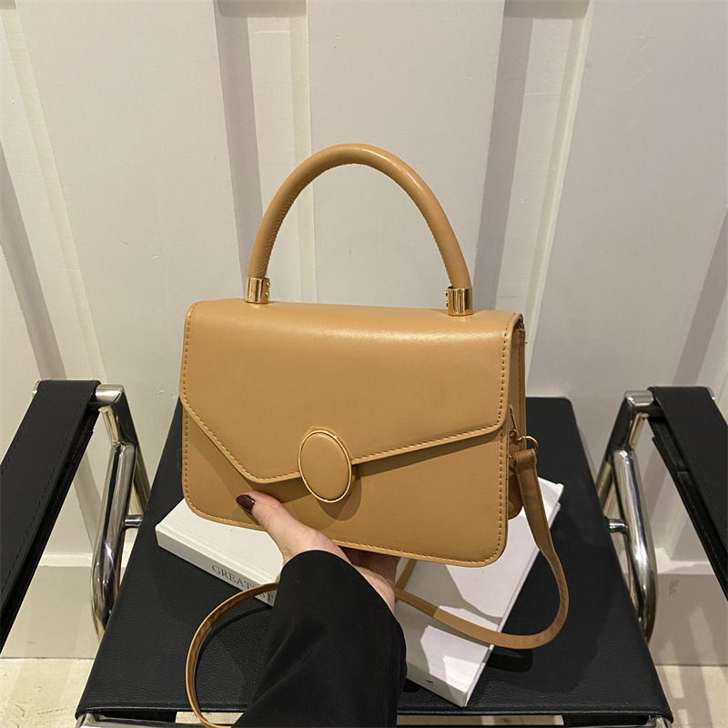 2025 primavera nuevo estilo simple y popular bolso de hombro coreano de color sólido simple bolso de literatura y arte para mujeres