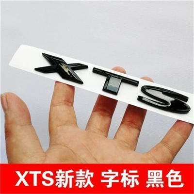 and XT5 models with — Car logo