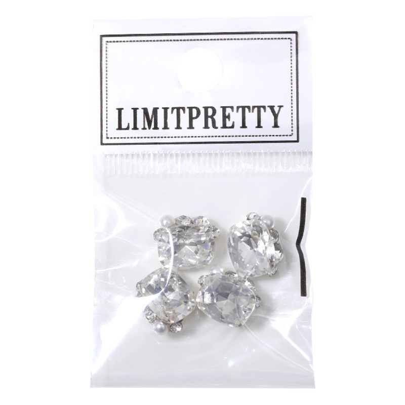 Popular online celebridad uñas pila de cristal diamante acabado blanco súper brillante corazón torcido grasa cuadrado incrustaciones perla decoraciones de uñas al por mayor