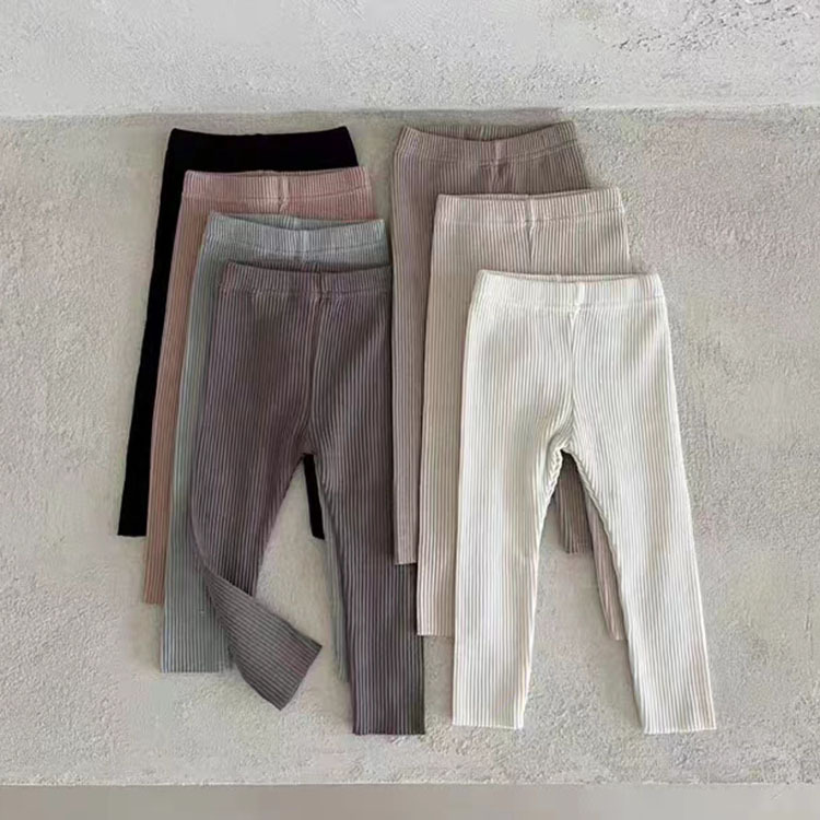 Pantalones para bebés modelos de primavera y verano para hombres y mujeres pantalones de color sólido para bebés leggings exteriores leggings elásticos para bebés recién nacidos