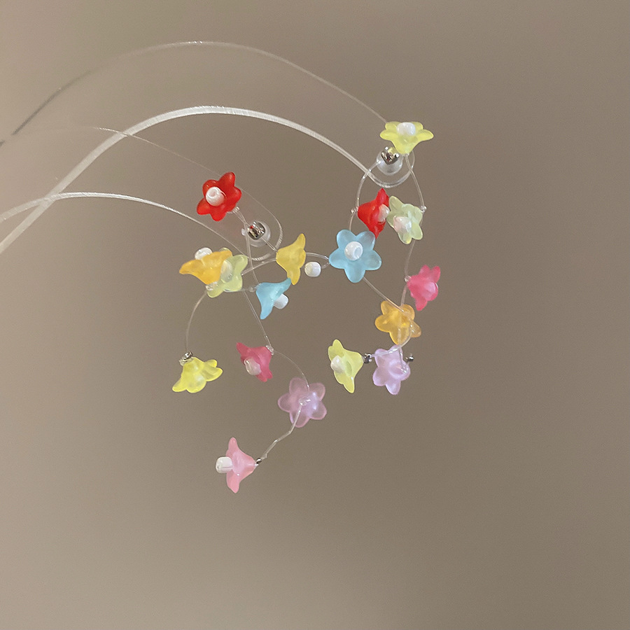 Pendientes de borla de flor de trompeta de color de aguja de plata Pendientes de estilo de vacaciones de verano Pendientes de todo fósforo de moda femenina Sentido de diseño nicho