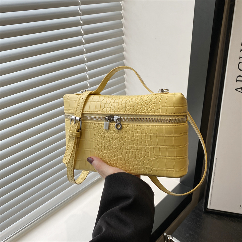 2025 textura simple bolso pequeño portátil nuevo bolso cuadrado pequeño de moda de moda bolso de mensajero de paso de alta gama