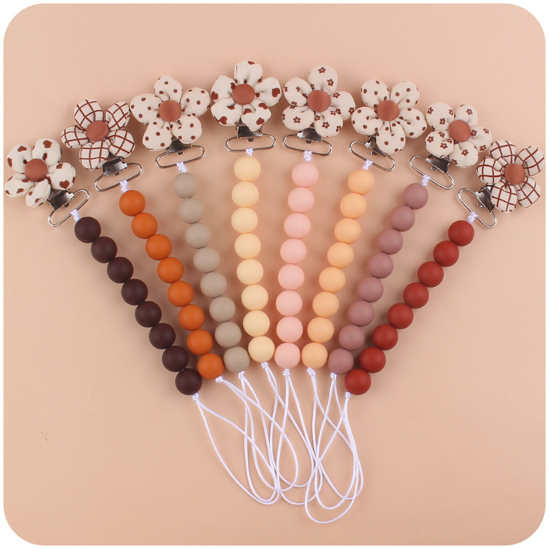 Nuevo bebé suministros de dibujos animados flor chupete clip calmante bebé creativo silicona mordedura pezón anti-gota cadena