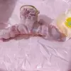 Розовый сложенный захват