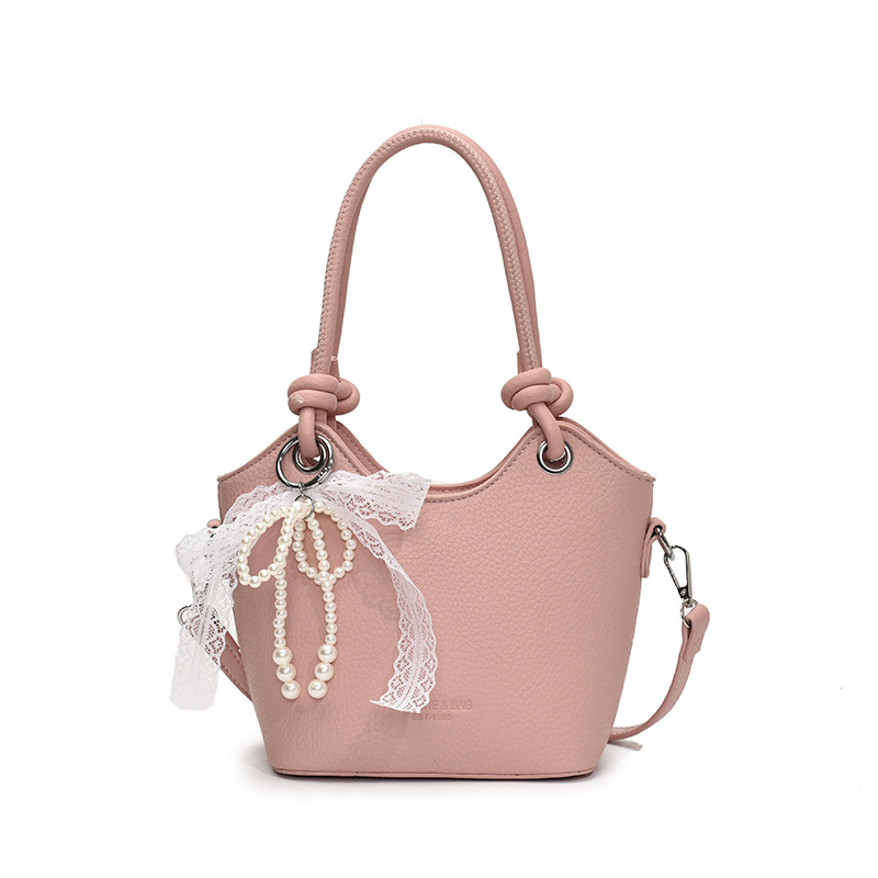 Bolso de cubo popular de este año para mujer 2025 nuevo bolso de mensajero de nicho de alta gama bolso de hombro de viajero súper caliente