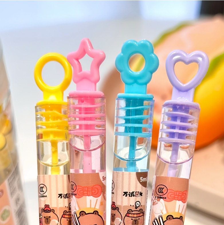 Cute Capi soplando palitos de burbujas, soplando agua de burbujas, juguetes coloridos para niños, juguetes de agua de burbujas para salidas al aire libre