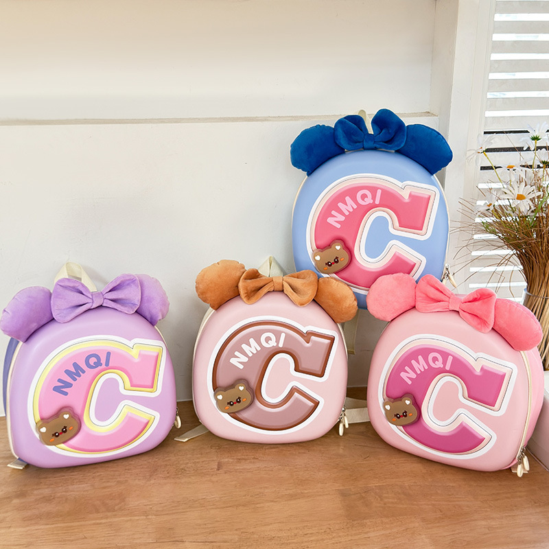 Jardín de infantes bolsas escolares dulces y lindas mochilas de arco para niños y niñas 2025 nueva bolsa de huevo para niños