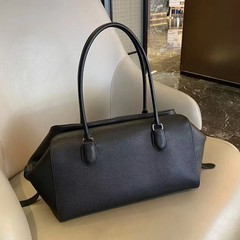 クロスボーダーの女性カバンのトップ層の牛革のシングル肩の特包ボーリングの通勤デザインの怠惰なファッションの手提げレジャーバッグの女性