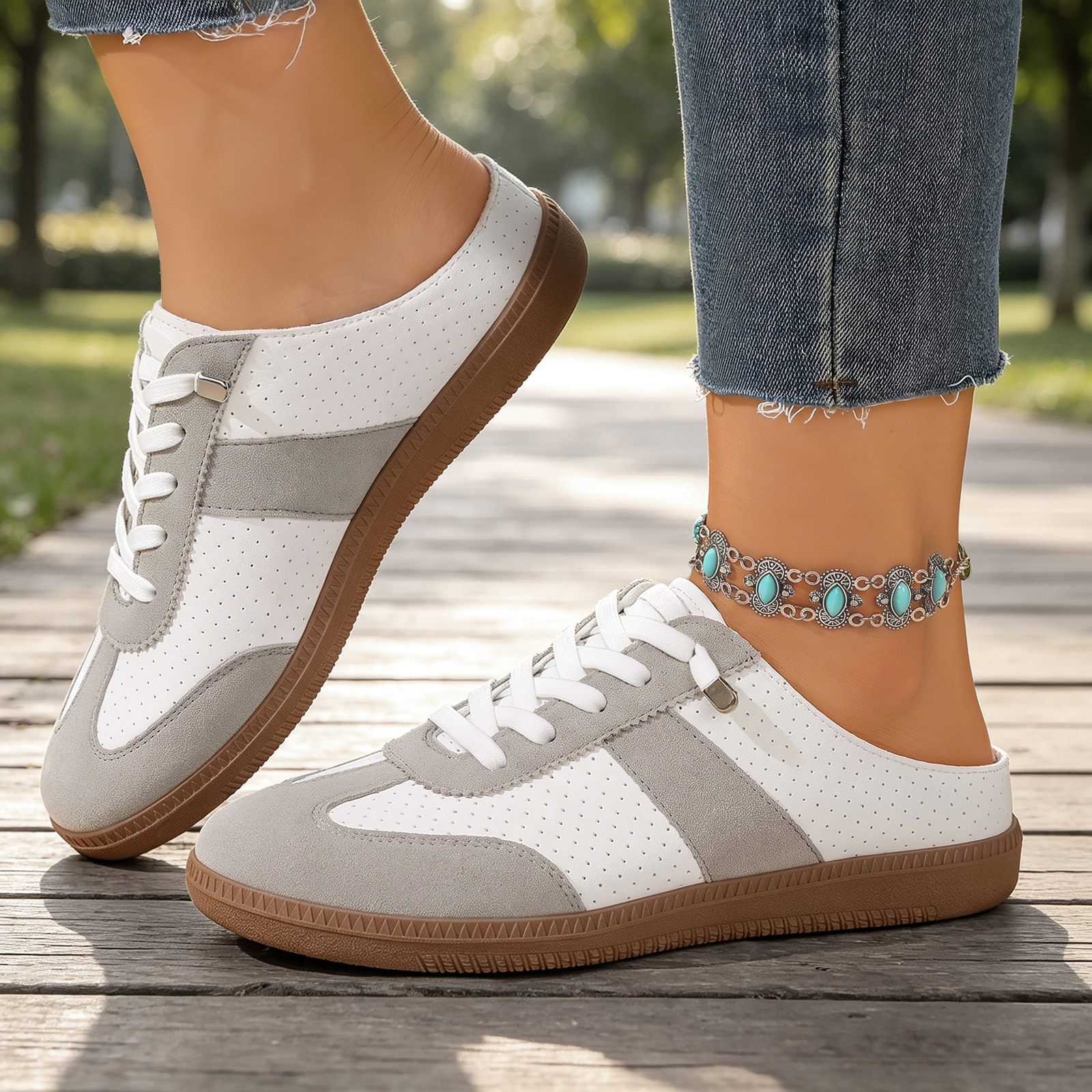 Zapatos de verano transfronterizos de mujer agujero de ventilación de la cabeza de lazo medio arrastrado de color con base suave zapatos perezosos de estilo de viaje ocio
