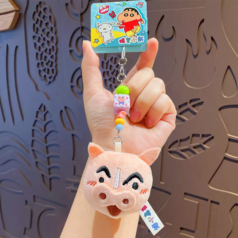 Crayons, mobile phone, pendant, cloth, doll