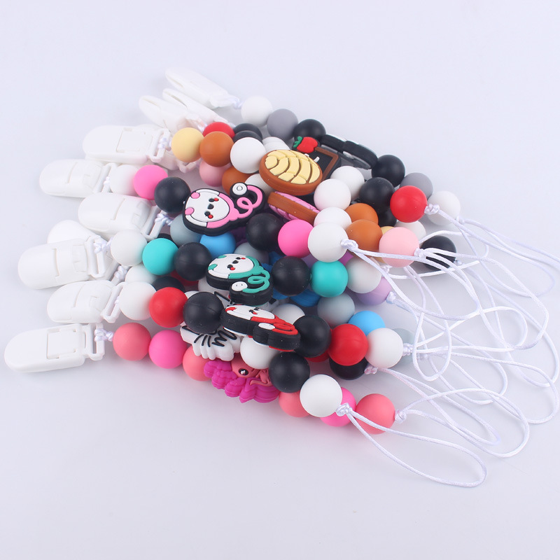 Nuevo bebé suministros chupete cadena creativa DIY dibujos animados estetoscopio pan cuerno mordedor cadena anti-gota