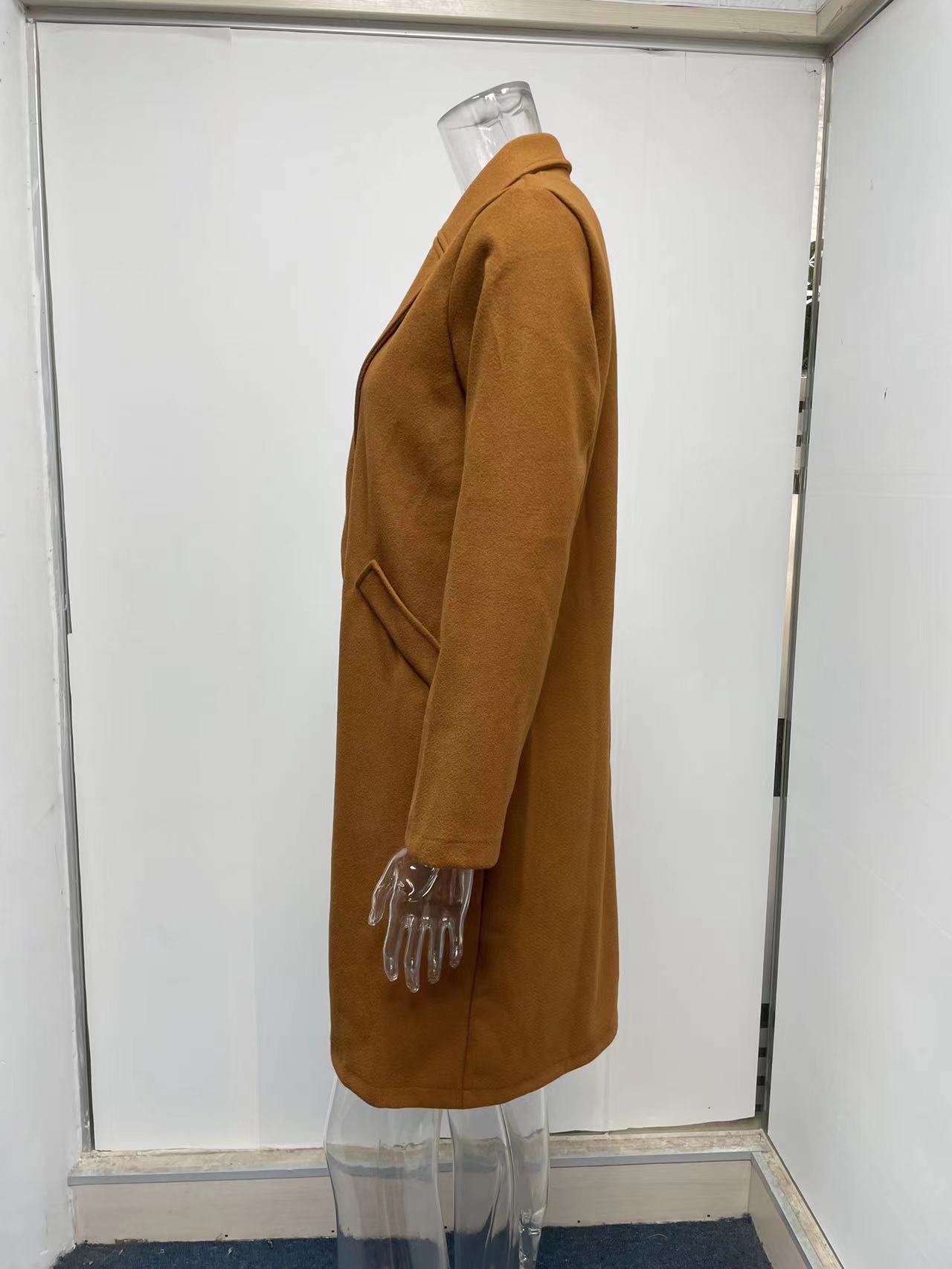 Title 18, Mid-length coat with solid lapels. Classic styl...