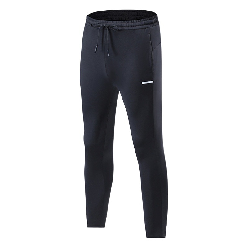 Primavera y otoño de los hombres al aire libre corriendo Pantalones deportivos de secado rápido transpirable flojo más tamaño casual estiramiento pantalones en stock impreso NK