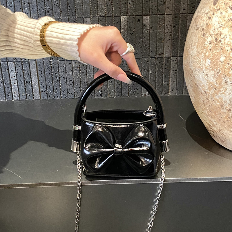 Mini lindos bolsos de mano para niños 2026 nuevo arco de moda infantil interesante lindos bolsos de hombro