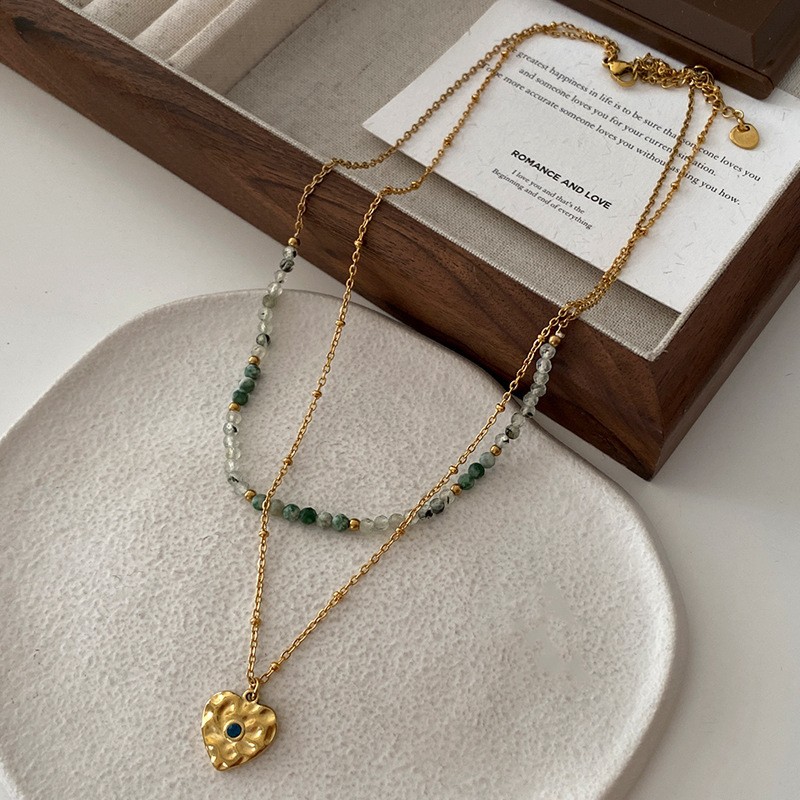 Collar con cuentas de ojo de tigre Maillard Cadena de suéter de otoño e invierno de alta calidad Acero de titanio Cadena de clavícula de piedra natural retro de lujo ligero