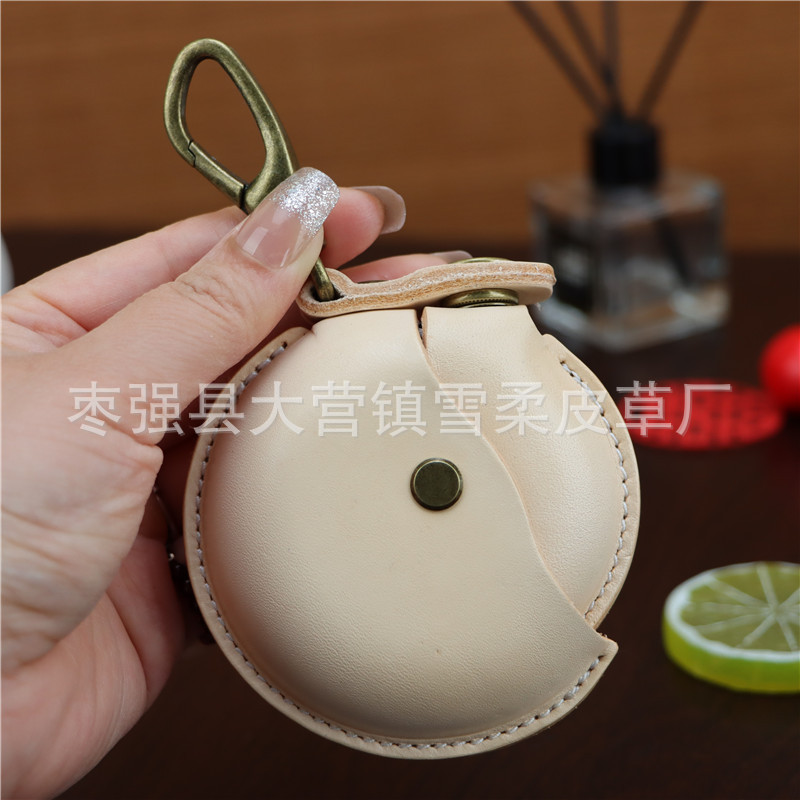 クリエイティブな一層牛革製ハンドメイド小銭入れ、イヤホンケーブル収納バッグ、丸型バッグ、ペンダント、小物入れ、レトロ収納バッグ