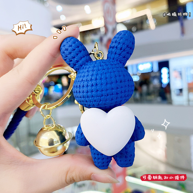 Resina creativa melocotón corazón tejido amor conejo llavero al por mayor ins pareja escuela coche llavero colgante