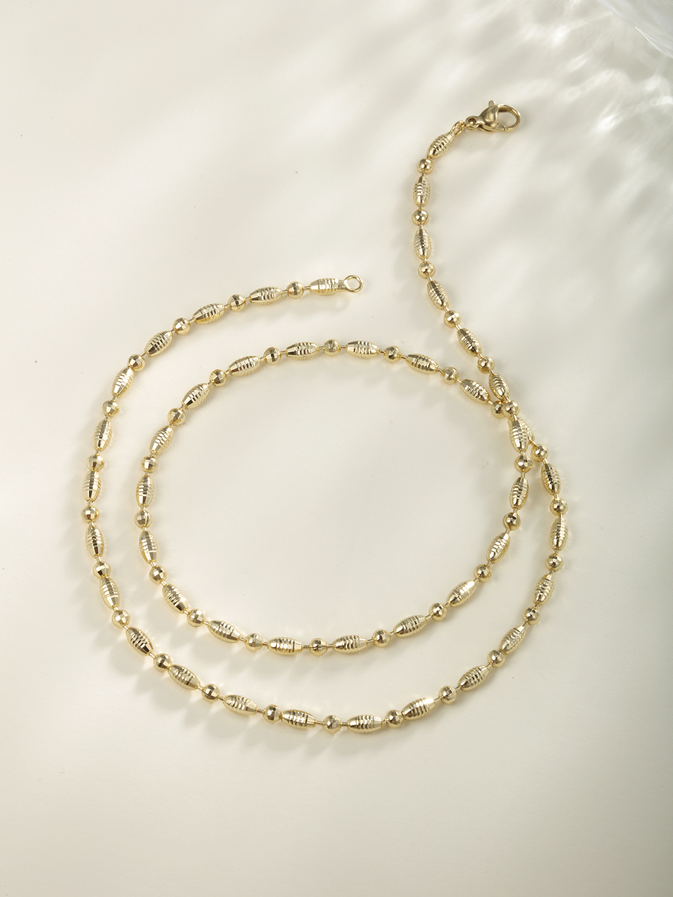 Joyería Xuping aleación japonesa y coreana galvanizada collar de cuentas ovales de arroz simple cadena cadena de oliva cadena de mujer