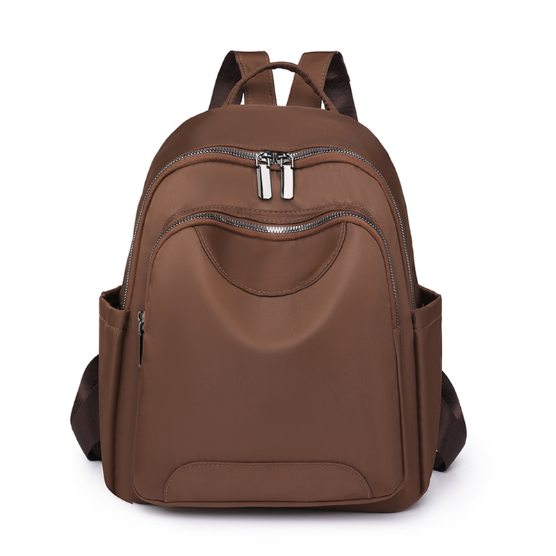 Fábrica al por mayor 2023 nueva mochila de nailon para mujer coreana simple mochila de viaje urbano mochila escolar de moda