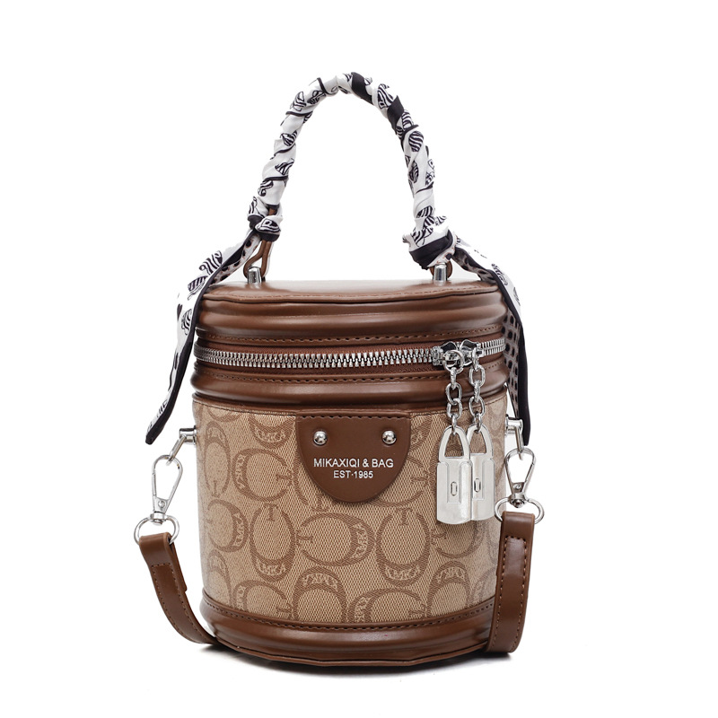 Bolsos de mujer transfronterizos Bolsos de moda Bolsos de cubo de ocio 2025 Bolsos de hombro de nueva tendencia Bolsos de mensajero de textura avanzada