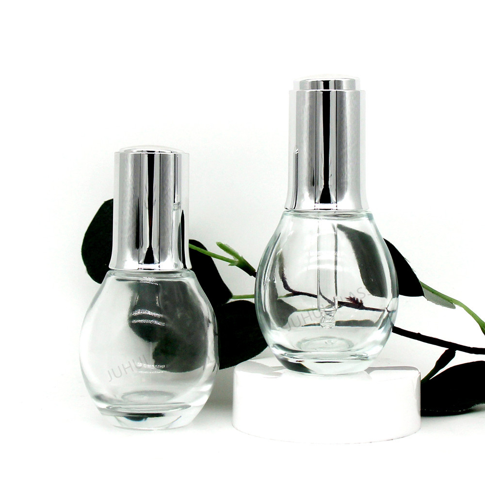 新款50ml精华油玻璃瓶圆形 旋转按压滴泵美肤肌底液分装瓶