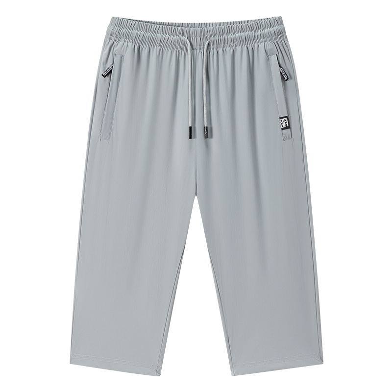 Pantalones casuales de nuevo estilo, pantalones de seda de hielo para hombres, pantalones con aire acondicionado para hombres, deportes transpirables, pantalones cortos de ocio, trajes de alta calidad