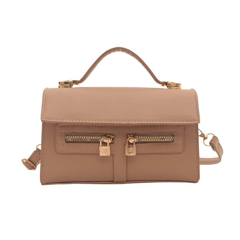 Diseño de doble cremallera personalidad simple 2024 nuevo estilo retro ocio de moda de hombro mochila temperamento bolso pequeño