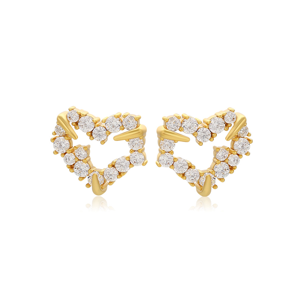 Joyas Xuping aleación de cobre joyas artificiales gemas en forma de corazón pernos de orejas de nicho femenino ligero lujo pendientes de amor en stock