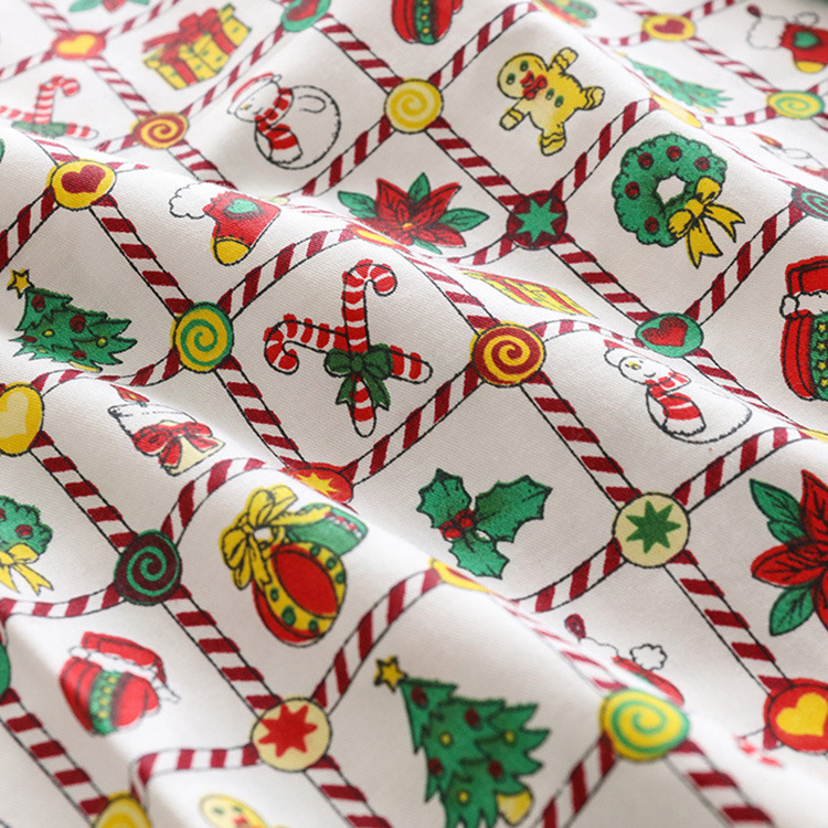 Inventario lotes de algodón de tela de impresión activa Navidad DIY proceso de costura