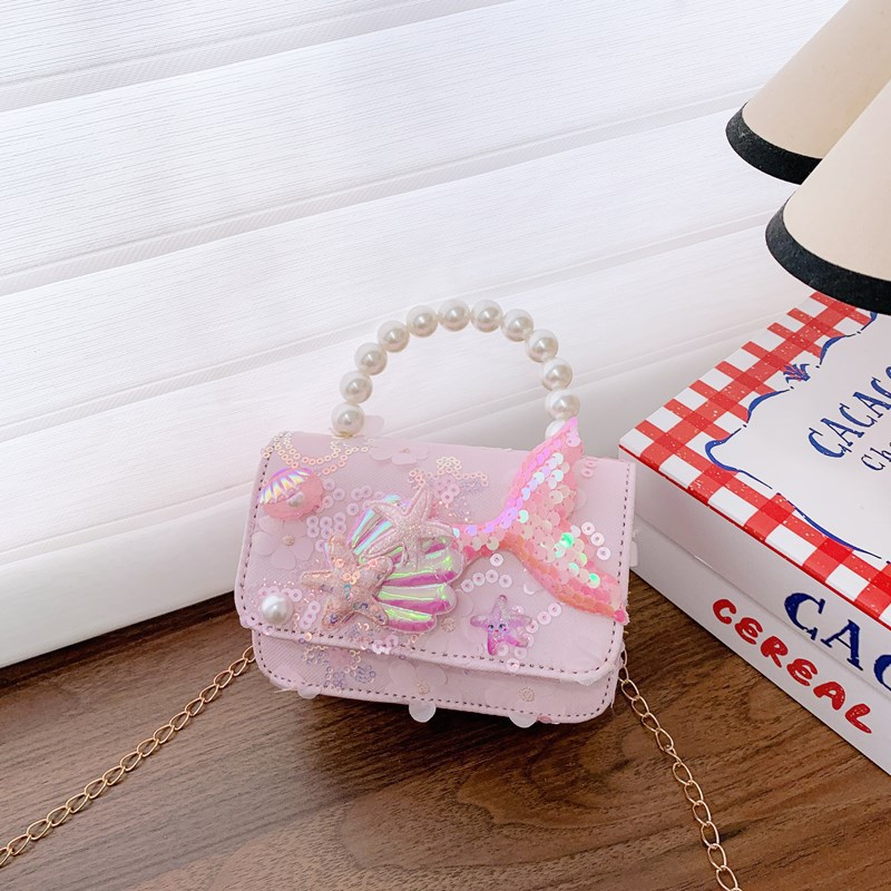 Bagos de perlas para niños 2025 nuevos bolsos de niños bolsos de mochila de niñas bolsos accesorios de princesa bolsos de viento de fragancia