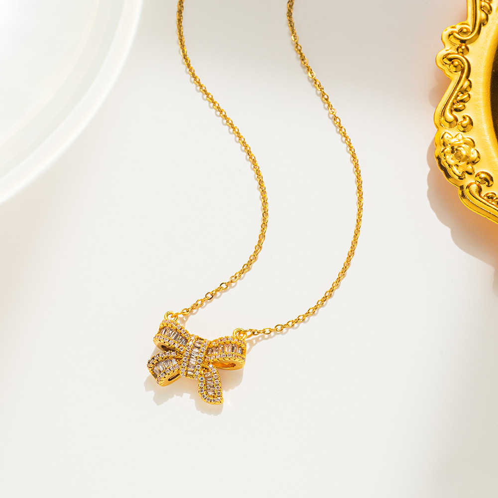 15g Weight 0.03µm-0.05µm Gold Plating Thickness PVD Coated Gold Plating Process Real Gold Plated Plating Material Copper Pendant Material Zircon Inlay Material Pendant Necklace Classification 316 Stainless Steel Chain Material cable chain Chain Type 1 Piece Quantity Daily, Date Occasion 316 Stainless Steel Material Bow Knot Pattern Women's Gender Simple Style Style Plating Craft PVD Coated Real Gold Plated Bow Knot Stainless Steel Simple Style Waterproof Non Tarnish Pendant Necklace