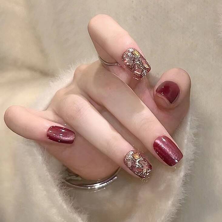 10 piezas de manicure de Año Nuevo alta sensación de rosa blanca perlas de vidrio ojo de gato manuales piezas de uñas al por mayor uñas cortas