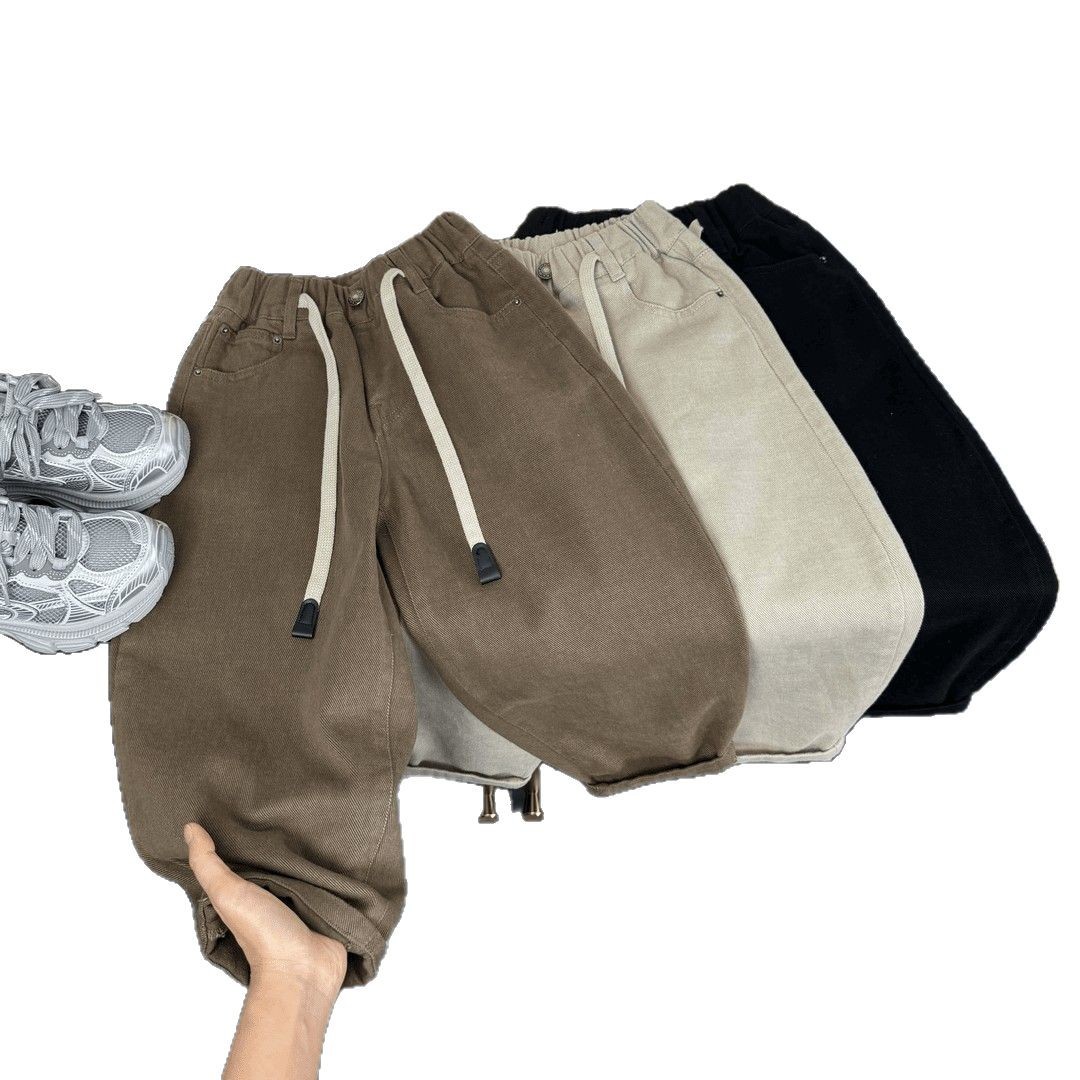 新しいファッションのファッションのファッションの子供服のズボンの男の子のズボンの春秋の金のゆったりしている服装の韓国版の男の子のカジュアルなズボン