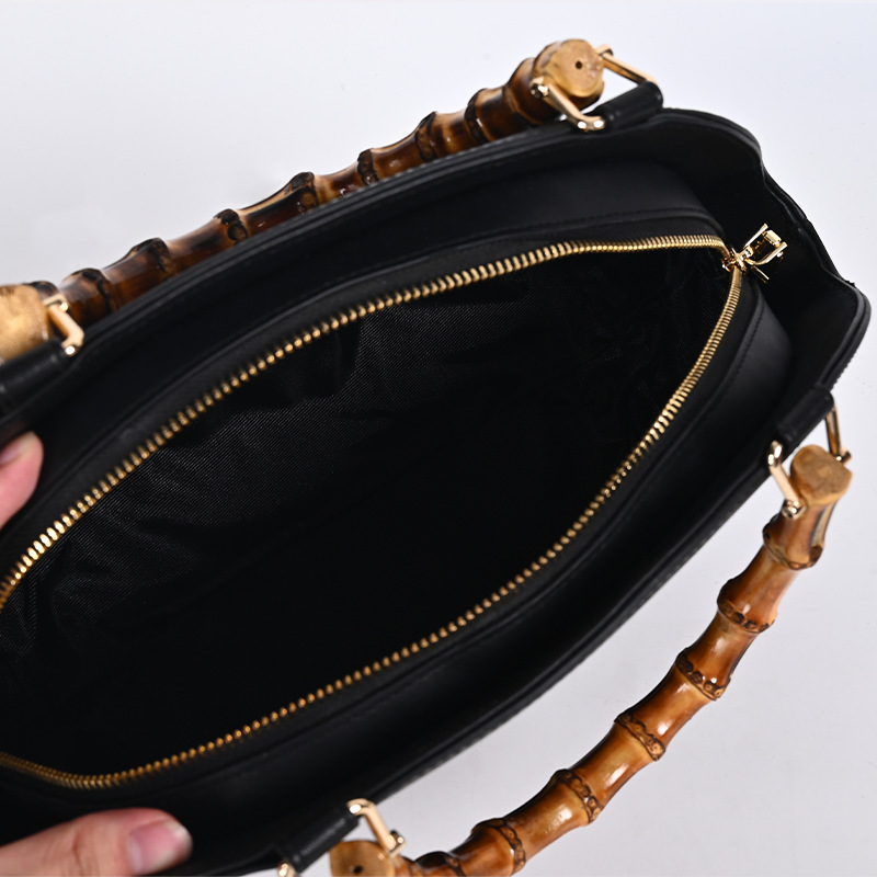 レトロな黒色編みハンドバッグのトップ層牛革通勤収納バッグ金物ファスナー大容量菱格小円バッグ|undefined