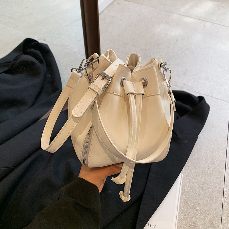 2024 Spring New Small Bucket Bag Cross-color Strap Shoulder Bag with Drawstring Women's Commuter Hand-held Single-shoulder Bag