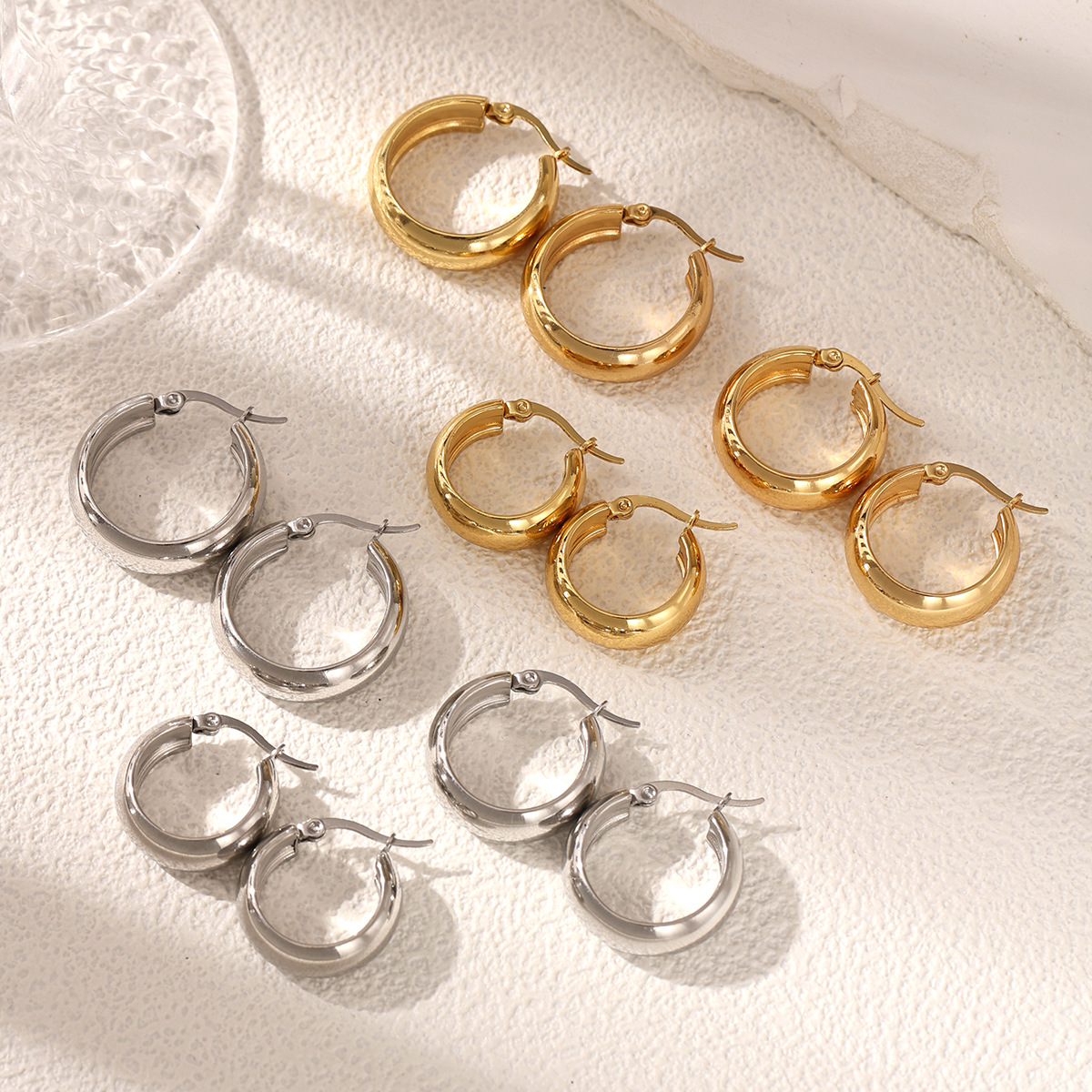 Taina europa y americana orejetas de acero inoxidable, anillo de acero de aluminio, geometría de diseño clásico, orejetas de joyería transfronteriza para mujeres image 1