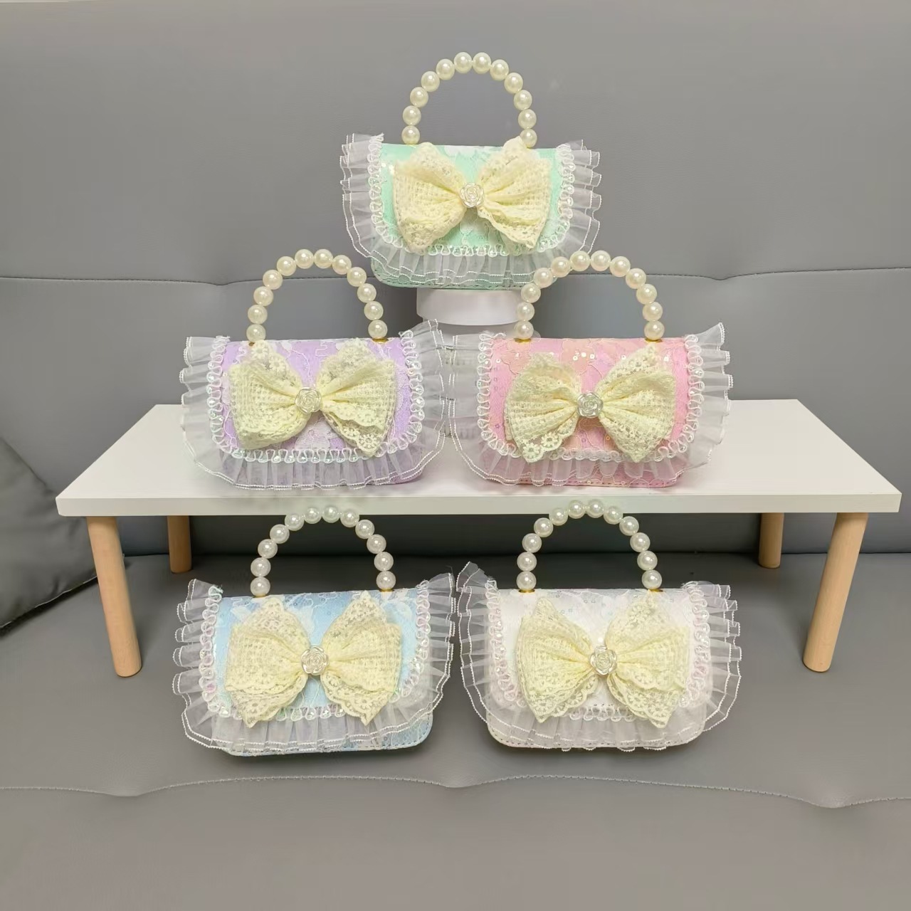 Bolso de princesa portátil de perlas, arco de encaje, bolso de hombro, bolso de cadena, bolso de cambio de Año Nuevo.