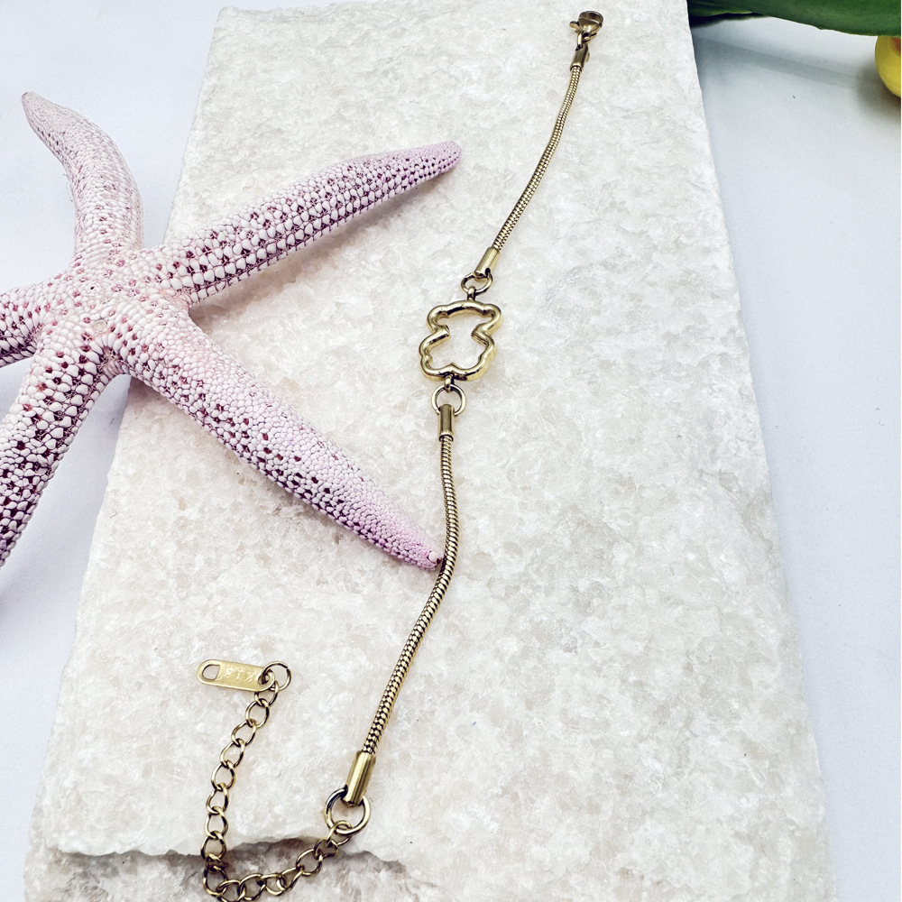 Oso tridimensional collar de titanio de acero pequeño animal colgante aretes pulsera anillo de hueso de serpiente cadena femenina estilo INS